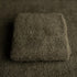 Deep fir green newborn photography fabric with a soft, fluffy, and stretchy texture for organic setups.