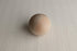 Soft ivory open-knit fabric posing wrap with a delicate, organic texture for newborn photography sessions.