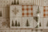 Holiday inspired newborn photography wrap with a patchwork design, featuring snowflakes, pine trees, and plaid patterns in beige, rust orange, and muted green, placed on a matching patterned fabric surface.