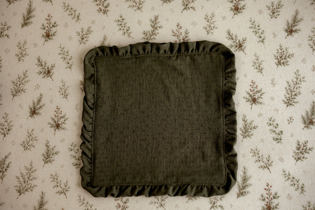Olive green ruffled mini blankie for newborn photography, styled on Mantle Garland evergreen floral posing fabric by Little Moon Boutique.