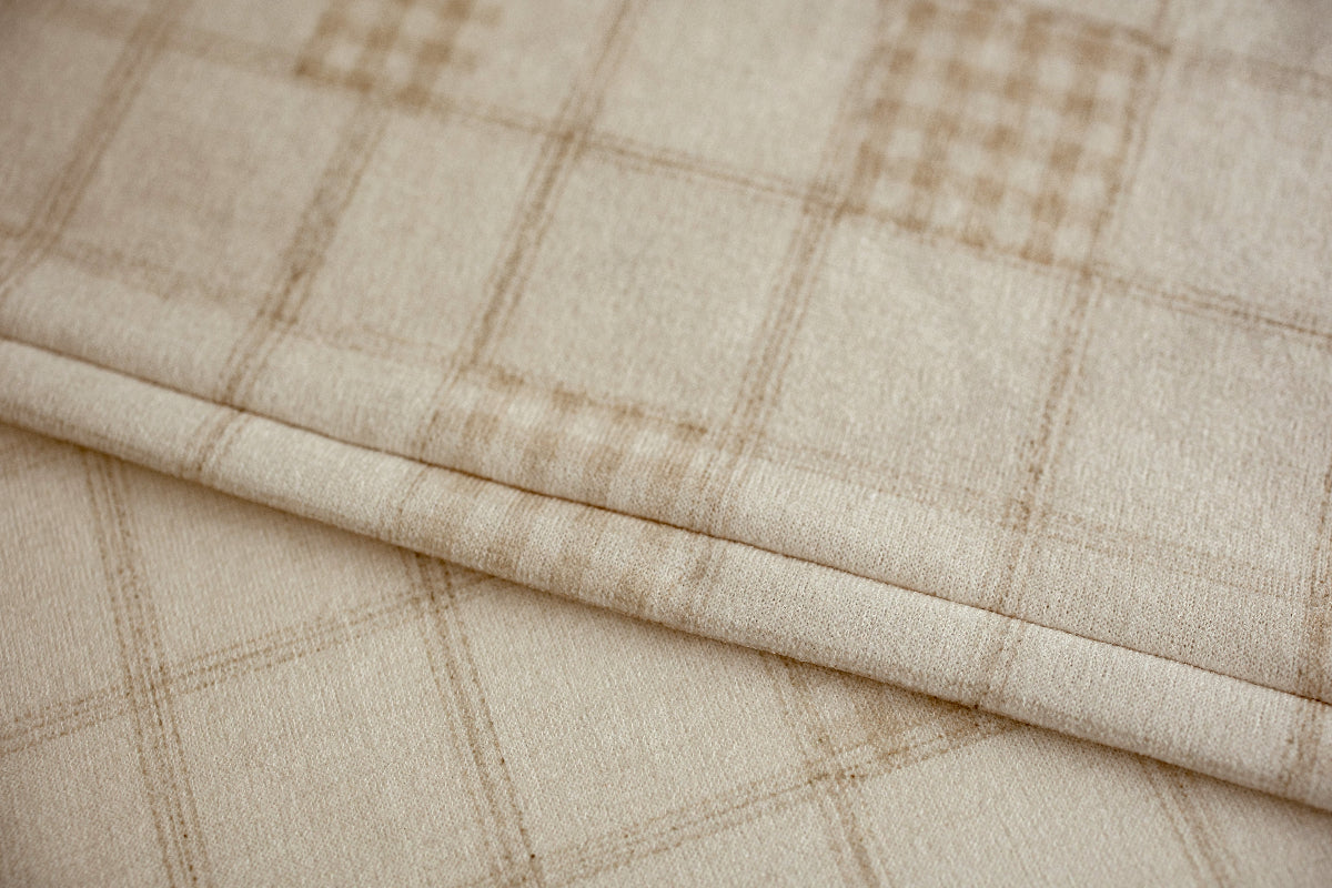 Grandpa's Twin neutral beige plaid newborn photography posing fabric folded to show the soft knit texture and warm oatmeal check design.
