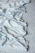 Sky blue newborn photography prop set featuring soft, ribbed fabric with delicate ruffled edges and a textured finish.