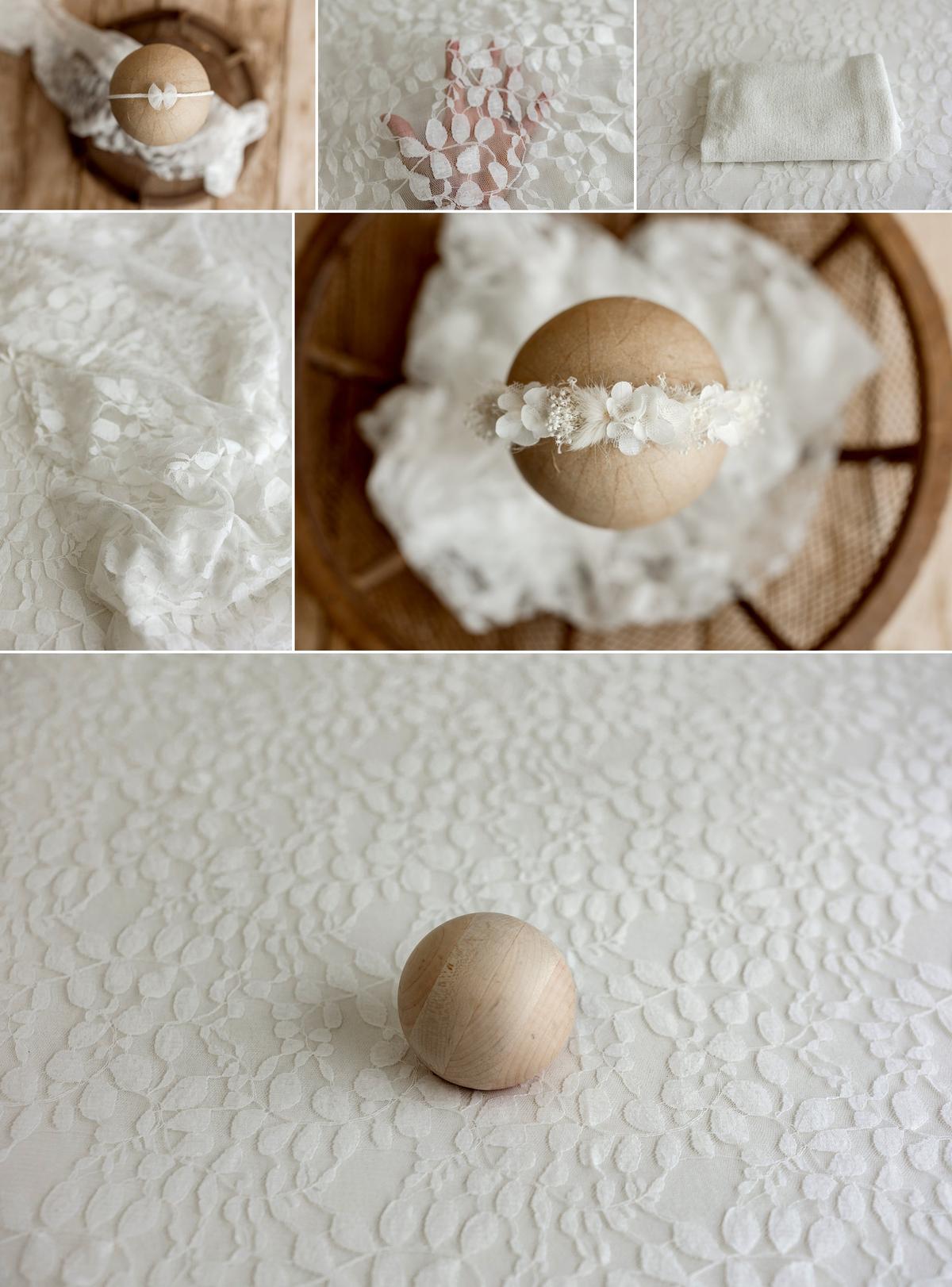 Minimalist newborn photography prop collection featuring ivory lace fabric, coordinating wrap, dainty bow tieback, and ivory floral headband.