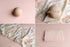 Blush pink newborn photography drop and wrap set with a floral butterfly print fabric and a matching delicate tieback.