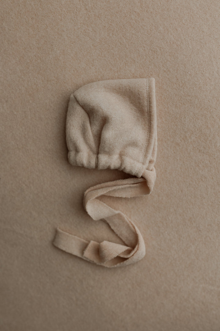 Neutral sand newborn bonnet with ties for photography prop styling
