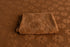 Rust fabric with raised daisy floral texture, styled for newborn photography backdrops and layering props.