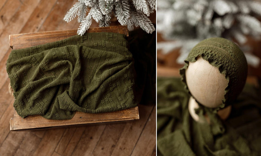 Deep mistletoe green newborn photography wrap and matching bonnet made of soft, textured stretch lace mesh fabric.